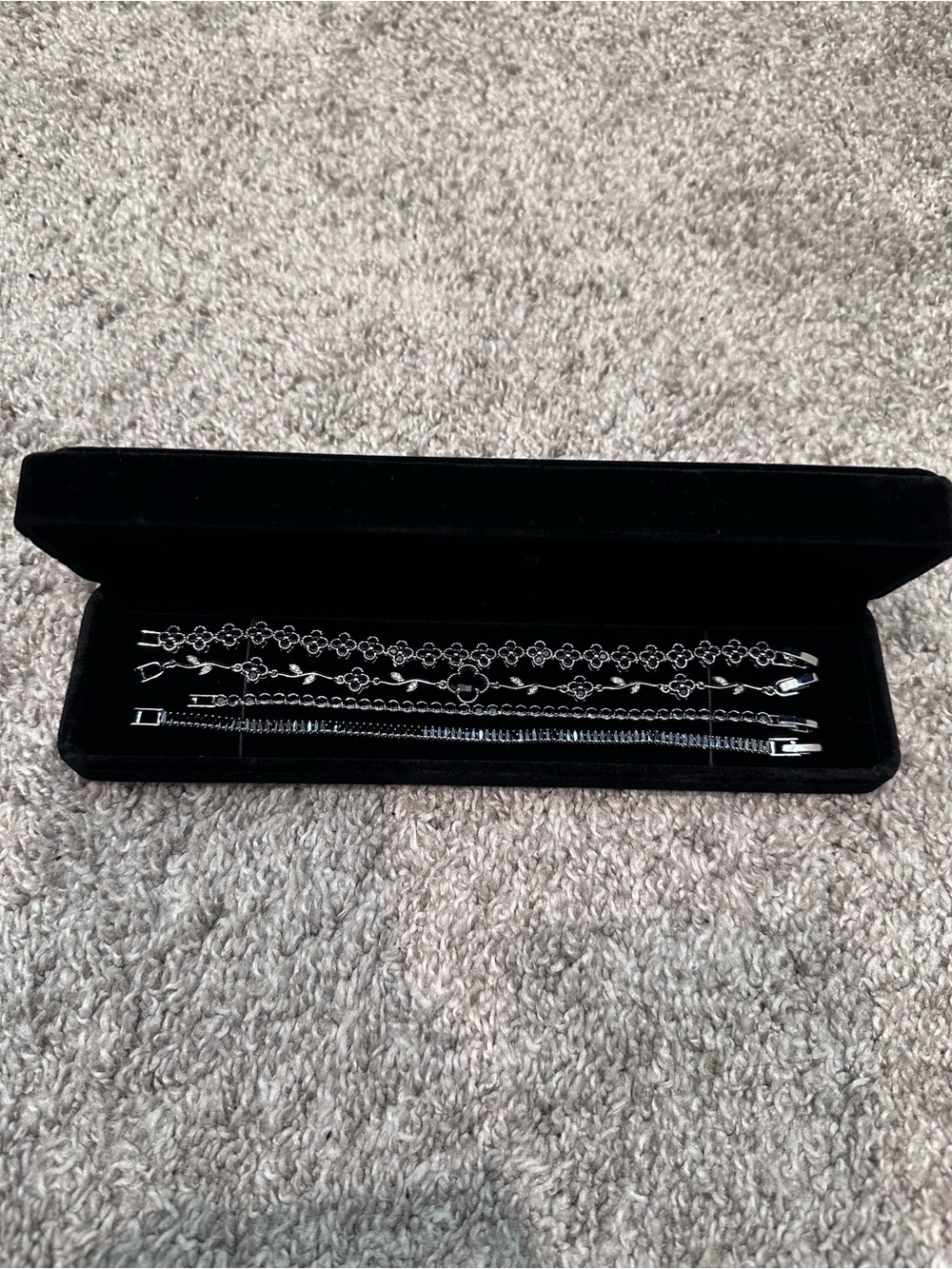 Silver black clover/flower + tennis bracelet stack